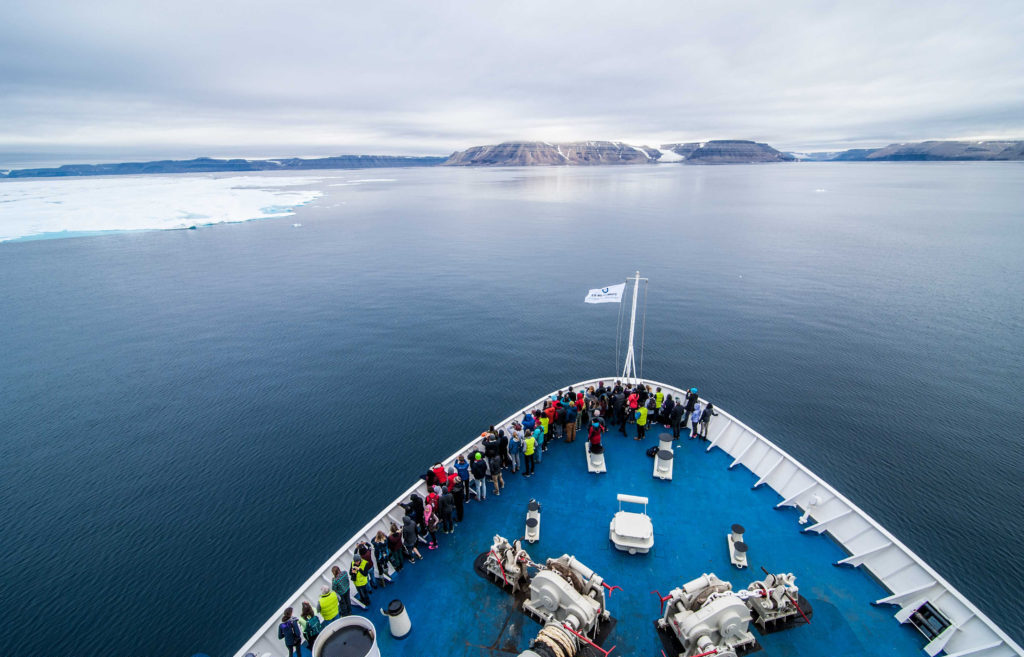 Students out on deck of the MS Ocean Endeavour looking for a spotted polar bear! Photo (c) Mike Sudoma/SOI Foundation