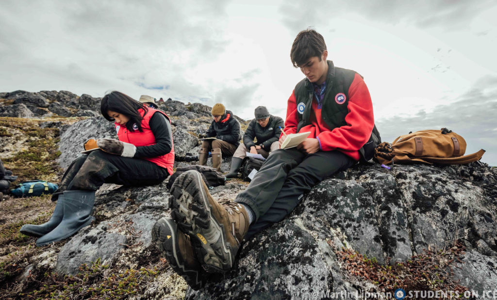 John journals during a reflection workshop on land. Photo (c) Martin Lipman/SOI Foundation