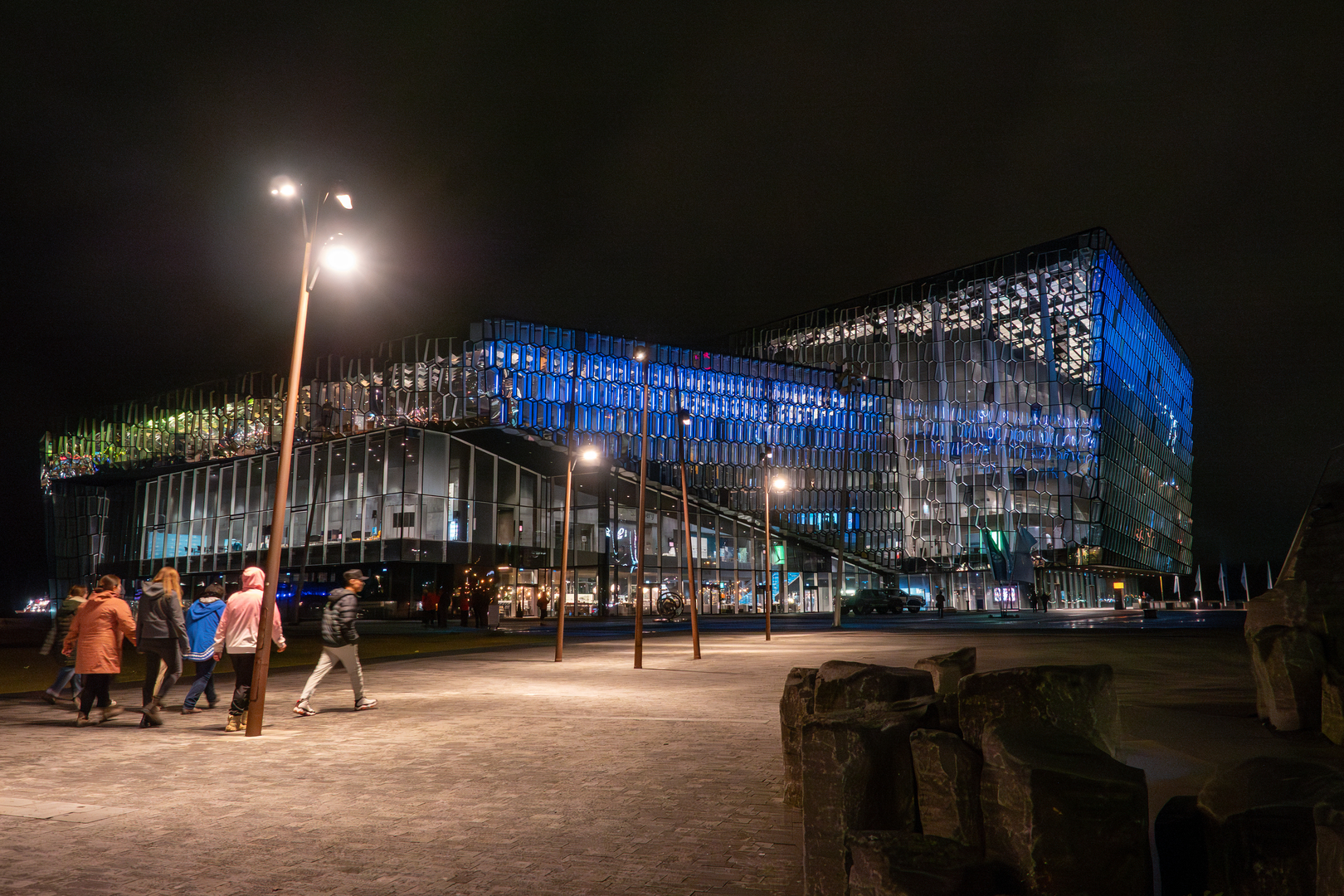 SOI delegates walk towards the Harpa Concert Hall in Reykjavik ahead of the 2025 Arctic Circle Assembly.